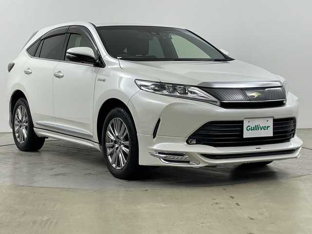 トヨタ ハリアー ハイブリッド プレミアム 道央・札幌 2018(平30)年 7.3万km ホワイトパールクリスタルシャイン ・４WD　/ハイブリッド/・TRDエアロ　F/S/R/・トヨタセーフティセンス/・プリクラッシュセーフティ/・レーダークルーズコントロール/・純正ディーラーOP9インチナビ/・DVD.CD.SD.BT.フルセグ/・バックカメラ/・パワーバックドア/・ハーフレザーシート/・パワーシート/シートヒーター/・LEDライト/オートハイビーム/・ビルトインETC/・スマートキー・カードキー