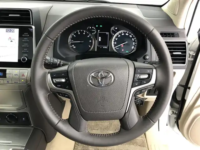 トヨタ ランドクルーザー プラド TX Lパッケージ マットブラED 愛知県 2022(令4)年 1.9万km ホワイトパールクリスタルシャイン １オーナー　/７人　/サンルーフ　/9インチナビ　/全方位カメラ　/ルーフレール　/レザーシート　/前席パワーシート　/シートヒーター　/エアーシート　/前後ドラレコ　/ＥＴＣ２．０　/ＭＴモード　/ＢＳＭ　/ＵＳＢ　/取説　/保証書