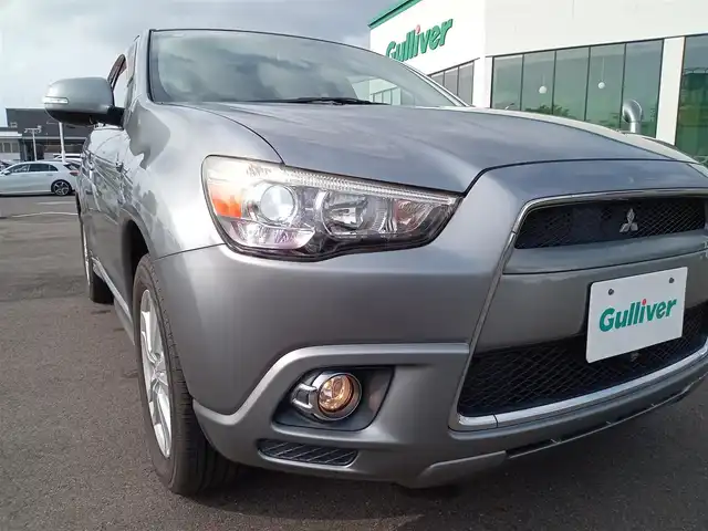 三菱 ＲＶＲ G 福井県 2011(平23)年 10.4万km チタニウムグレーメタリック 純正17インチAW/４WD/バックカメラ/シートヒーター/パドルシフト/キセノンヘッドライト/Fフォグ/前後ドライブレコーダー/クルーズコントロール/ETC/アルパイン7インチメモリナビ/横滑り防止装置/盗難防止装置/ダブルエアバッグ/純正フロアマット/スマートキー