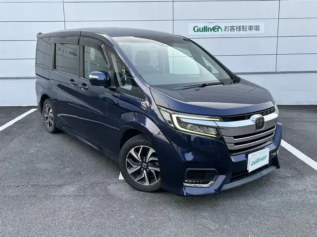 ホンダ ステップワゴン スパーダ ホンダセンシング 長崎県 2018(平30)年 10.6万km オブシダンブルーパール 純正9インチナビ/（CD/DVD/BT/フルセグ）/バックカメラ/フリップダウンモニター/衝突軽減システム/レーンアシスト/レーダークルーズ/ETC/両側パワースライドドア/パドルシフト/オートライト/純正16インチAW