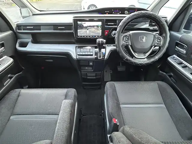 ホンダ ステップワゴン スパーダ ホンダセンシング 長崎県 2018(平30)年 10.6万km オブシダンブルーパール 純正9インチナビ/（CD/DVD/BT/フルセグ）/バックカメラ/フリップダウンモニター/衝突軽減システム/レーンアシスト/レーダークルーズ/ETC/両側パワースライドドア/パドルシフト/オートライト/純正16インチAW