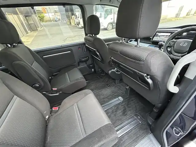 ホンダ ステップワゴン スパーダ ホンダセンシング 長崎県 2018(平30)年 10.6万km オブシダンブルーパール 純正9インチナビ/（CD/DVD/BT/フルセグ）/バックカメラ/フリップダウンモニター/衝突軽減システム/レーンアシスト/レーダークルーズ/ETC/両側パワースライドドア/パドルシフト/オートライト/純正16インチAW