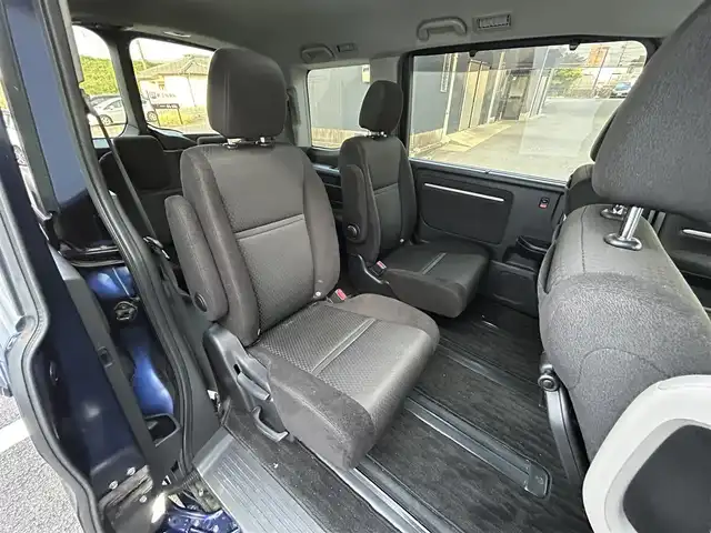 ホンダ ステップワゴン スパーダ ホンダセンシング 長崎県 2018(平30)年 10.6万km オブシダンブルーパール 純正9インチナビ/（CD/DVD/BT/フルセグ）/バックカメラ/フリップダウンモニター/衝突軽減システム/レーンアシスト/レーダークルーズ/ETC/両側パワースライドドア/パドルシフト/オートライト/純正16インチAW