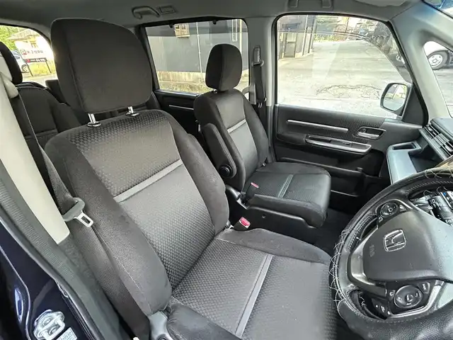 ホンダ ステップワゴン スパーダ ホンダセンシング 長崎県 2018(平30)年 10.6万km オブシダンブルーパール 純正9インチナビ/（CD/DVD/BT/フルセグ）/バックカメラ/フリップダウンモニター/衝突軽減システム/レーンアシスト/レーダークルーズ/ETC/両側パワースライドドア/パドルシフト/オートライト/純正16インチAW