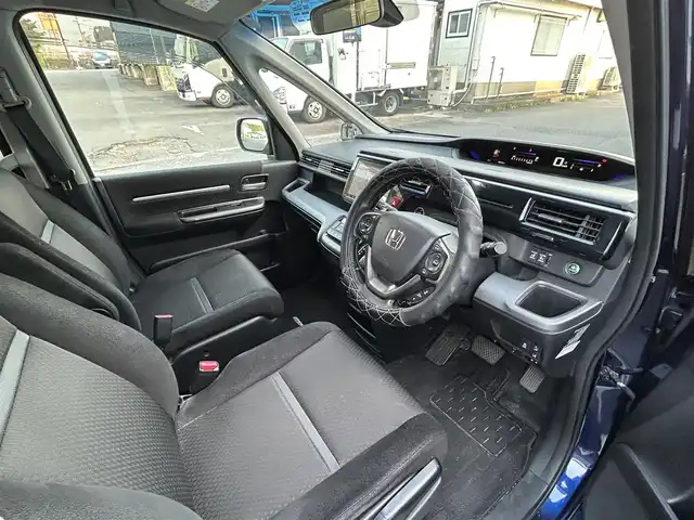 ホンダ ステップワゴン スパーダ ホンダセンシング 長崎県 2018(平30)年 10.6万km オブシダンブルーパール 純正9インチナビ/（CD/DVD/BT/フルセグ）/バックカメラ/フリップダウンモニター/衝突軽減システム/レーンアシスト/レーダークルーズ/ETC/両側パワースライドドア/パドルシフト/オートライト/純正16インチAW