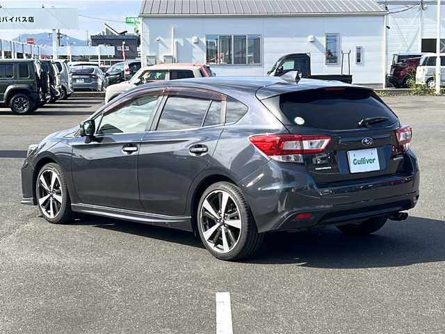 スバル インプレッサ スポーツ 2．0i－S アイサイト 鹿児島県 2018(平30)年 10.7万km ダークグレーメタリック ＳＴＩエアロ/ＭＴモード付ＡＴ/パドルシフト/４ＷＤ/レーダークルーズ/純正ナビ/フルセグＴＶ/バックカメラ/ブラインドスポットモニター/ＬＥＤヘッドライト/サイドビューカメラ/ドライブレコーダー/Bluetooth接続/CD再生/USB/コーナーセンサー/衝突被害軽減システム/オートライト/横滑り防止装置/レーンキープアシスト/純正18インチアルミホイール/運転席パワーシート/純正フロアマット/スマートキー/プッシュスタート