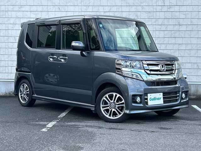 ホンダ Ｎ ＢＯＸ カスタム G Lパッケージ 大阪府 2016(平28)年 5.1万km ポリッシュドメタルメタリック 純正ナビ(BT/CD/DVD/SD/USB/フルセグ)/バックカメラ/衝突被害軽減システム/オートライト/純正アルミホイール/純正フロアマット/片側パワースライドドア/ドライブレコーダー/ビルトインETC/フルフラットシート/チップアップシート/スペアキー×1/カーテンエアバック/HIDヘッドライト