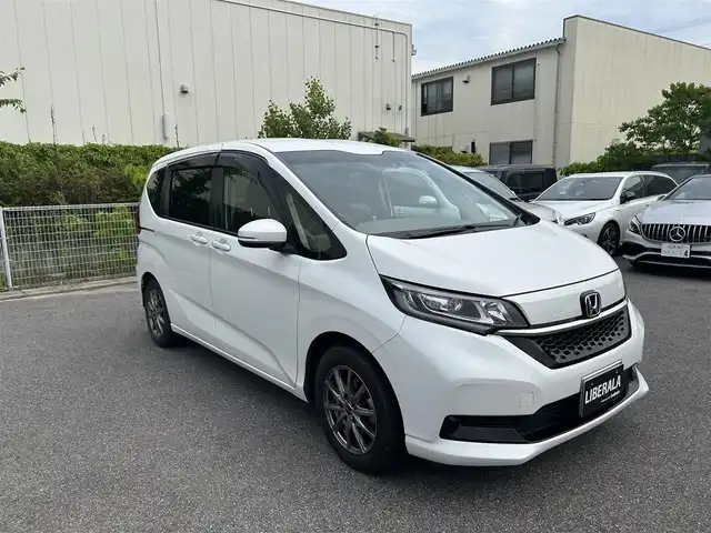 ホンダ フリード G ホンダセンシング 滋賀県 2021(令3)年 3.8万km パール ワンオーナー/メモリナビ（ディーラーOP）/フルセグテレビ/バックカメラ/クルーズコントロール追従付き/両側パワースライドドア/アイドリングストップ/ドアバイザー/ETC/ドラレコ　F/R/純正スチールホイル、夏タイヤ（185-65-15）