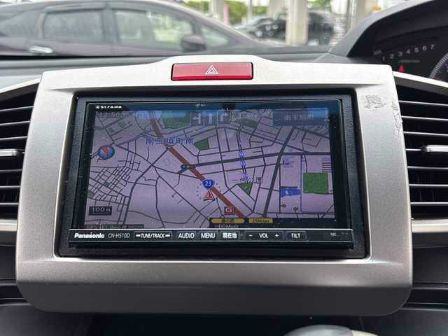 ホンダ フリード スパイク G ジャストセレクション 三重県 2012(平24)年 7.1万km プレミアムホワイトパール 登録時70183km/禁煙車/社外ナビ(AM/FM/CD/DVD/Bluetooth)/ETC/片側パワースライドドア/アイドリングストップ/AAC/ドアバイザー/電格ミラー/横滑り防止装置/リモコンキー