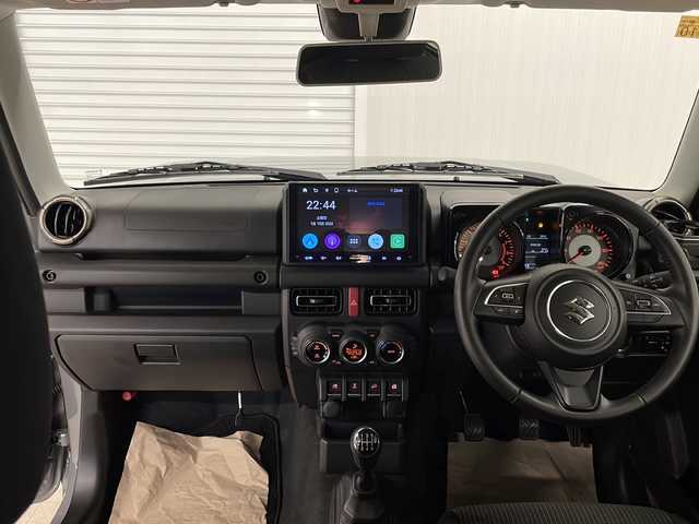 スズキ ジムニー XC 熊本県 2023(令5)年 2万km ミディアムグレー ディスプレイオーディオ（carplay/ＢＴ/ラジオ）/バックカメラ/5MT/クルーズコントロール/衝突軽減システム/レーンキープアシスト/横滑り防止装置/ステアリングスイッチ/Ｄ・Ｎ席シートヒーター/プッシュスタート/スマートキー/純正フロアマット/純正ドアバイザー/純正16インチＡＷ