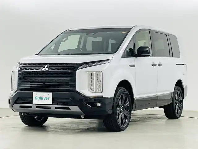 三菱 デリカＤ：５ シャモニー 福島県 2025(令7)年 0.1万km未満 パールⅡ 登録済未使用車/衝突被害軽減ブレーキ/・レーンキープアシスト/・ブラインドスポットモニター/・レーダークルーズコントロール/両側パワースライドドア/パワーバックドア/アイドリングストップ/電子パーキング/・オートホールド/全方位カメラ/革巻きステアリング/・ステアリングリモコン/・ステアリングヒーター/・パドルシフト/ハーフレザーシート/・パワーシート(運転席)/・シートヒーター(運転席/助手席)/プッシュスタート/・スマートキー/・スペアキー/LEDヘッドライト/・オートライト/・フォグライト/電動格納ミラー