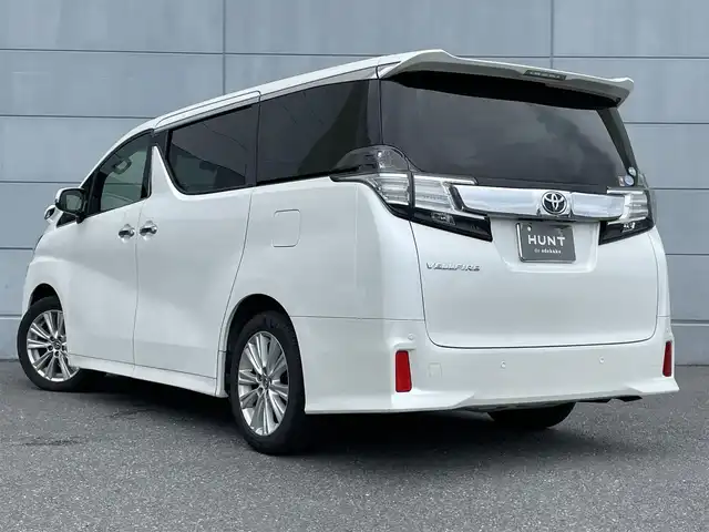 トヨタ ヴェルファイア Z 千葉県 2015(平27)年 5.2万km ホワイトパールクリスタルシャイン 純正ナビ/フルセグTV/バックカメラ/両側パワースライドドア/サンルーフ/フリップダウンモニター/ビルトインETC/AC100V/オットマン/オートライト/フォグライト/コーナーセンサー/プッシュスタート/スマートキー
