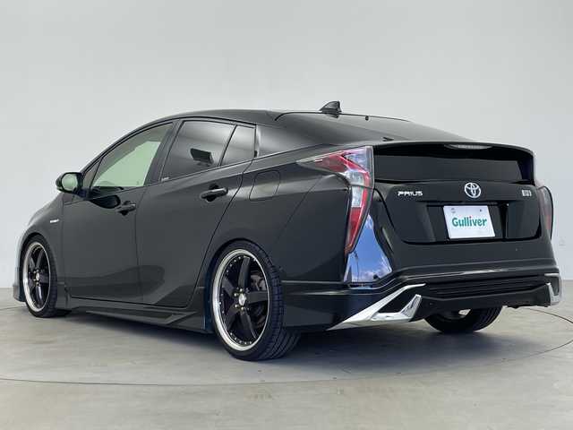 トヨタ プリウス Sセーフティプラス 鹿児島県 2017(平29)年 14.6万km アティチュードブラックマイカ TEIN車高調/純正型ナビ/（フルセグＴＶ/Bluetooth)/HDMI/シートヒーター/バックカメラ/ヘッドアップディスプレイ/ＥＴＣ/セーフティセンス/シートカバー/衝突軽減/レーダークルーズコントロール/ＬＥＤヘッドライト/社外19インチアルミホイール/オートライト/フォグランプ/保証書/取扱説明書