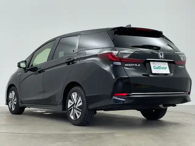 ホンダ シャトル ハイブリッド X ホンダセンシング 鹿児島県 2019(令1)年 5万km クリスタルブラックパール 純正SDナビ/（AM/FM/CD/DVD/Bluetooth/フルセグ）/バックカメラ/ホンダセンシング/レーダークルーズコントロール/レーンキープアシスト/衝突被害軽減ブレーキ/シートヒーター/ETC/ステアリングリモコン/前後ドライブレコーダー/純正フロアマット/スマートキー/プッシュスタート/オートエアコン/オートライト/LEDヘッドライト