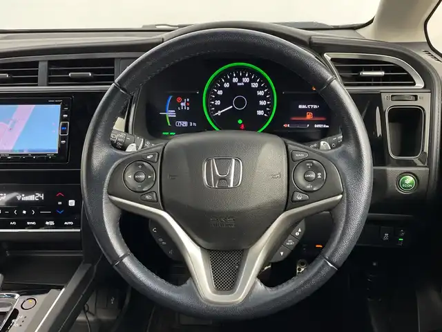 ホンダ シャトル ハイブリッド X ホンダセンシング 鹿児島県 2019(令1)年 5万km クリスタルブラックパール 純正SDナビ/（AM/FM/CD/DVD/Bluetooth/フルセグ）/バックカメラ/ホンダセンシング/レーダークルーズコントロール/レーンキープアシスト/衝突被害軽減ブレーキ/シートヒーター/ETC/ステアリングリモコン/前後ドライブレコーダー/純正フロアマット/スマートキー/プッシュスタート/オートエアコン/オートライト/LEDヘッドライト