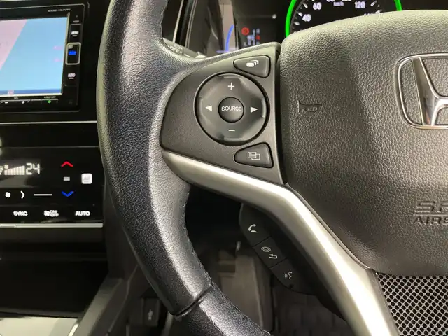 ホンダ シャトル ハイブリッド X ホンダセンシング 鹿児島県 2019(令1)年 5万km クリスタルブラックパール 純正SDナビ/（AM/FM/CD/DVD/Bluetooth/フルセグ）/バックカメラ/ホンダセンシング/レーダークルーズコントロール/レーンキープアシスト/衝突被害軽減ブレーキ/シートヒーター/ETC/ステアリングリモコン/前後ドライブレコーダー/純正フロアマット/スマートキー/プッシュスタート/オートエアコン/オートライト/LEDヘッドライト