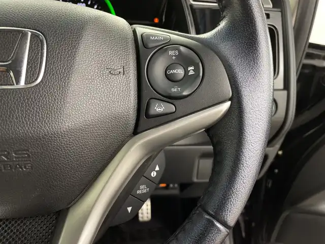 ホンダ シャトル ハイブリッド X ホンダセンシング 鹿児島県 2019(令1)年 5万km クリスタルブラックパール 純正SDナビ/（AM/FM/CD/DVD/Bluetooth/フルセグ）/バックカメラ/ホンダセンシング/レーダークルーズコントロール/レーンキープアシスト/衝突被害軽減ブレーキ/シートヒーター/ETC/ステアリングリモコン/前後ドライブレコーダー/純正フロアマット/スマートキー/プッシュスタート/オートエアコン/オートライト/LEDヘッドライト