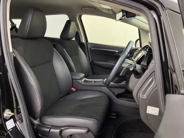 ホンダ シャトル ハイブリッド X ホンダセンシング 鹿児島県 2019(令1)年 5万km クリスタルブラックパール 純正SDナビ/（AM/FM/CD/DVD/Bluetooth/フルセグ）/バックカメラ/ホンダセンシング/レーダークルーズコントロール/レーンキープアシスト/衝突被害軽減ブレーキ/シートヒーター/ETC/ステアリングリモコン/前後ドライブレコーダー/純正フロアマット/スマートキー/プッシュスタート/オートエアコン/オートライト/LEDヘッドライト