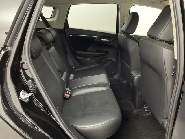 ホンダ シャトル ハイブリッド X ホンダセンシング 鹿児島県 2019(令1)年 5万km クリスタルブラックパール 純正SDナビ/（AM/FM/CD/DVD/Bluetooth/フルセグ）/バックカメラ/ホンダセンシング/レーダークルーズコントロール/レーンキープアシスト/衝突被害軽減ブレーキ/シートヒーター/ETC/ステアリングリモコン/前後ドライブレコーダー/純正フロアマット/スマートキー/プッシュスタート/オートエアコン/オートライト/LEDヘッドライト