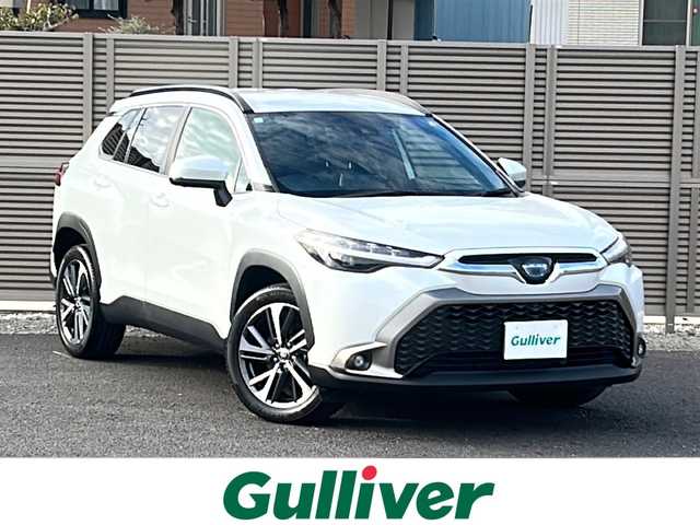トヨタ カローラ クロス ハイブリッド Z 千葉県 2023(令5)年 1.5万km プラチナホワイトパールマイカ ワンオーナー/純正HDDナビ/フルセグテレビ/Bluetooth/バックカメラ/クルーズコントロール/ビルトインETC/ドラレコ前後/パワーシート（D席）/シートヒーター（前列）/ハーフレザーシート/パワーバックドア/プリクラッシュセーフティシステム/レーダークルーズコントロール/ブラインドスポットモニター/リヤクロストラフィックアラート/パーキングサポートブレーキ/ロードサインアシスト/スペアキー×１/スマートキー/純正アルミホイール/保証書・取扱説明書