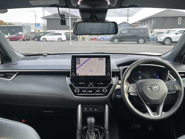 トヨタ カローラ クロス ハイブリッド Z 千葉県 2023(令5)年 1.5万km プラチナホワイトパールマイカ ワンオーナー/純正HDDナビ/フルセグテレビ/Bluetooth/バックカメラ/クルーズコントロール/ビルトインETC/ドラレコ前後/パワーシート（D席）/シートヒーター（前列）/ハーフレザーシート/パワーバックドア/プリクラッシュセーフティシステム/レーダークルーズコントロール/ブラインドスポットモニター/リヤクロストラフィックアラート/パーキングサポートブレーキ/ロードサインアシスト/スペアキー×１/スマートキー/純正アルミホイール/保証書・取扱説明書
