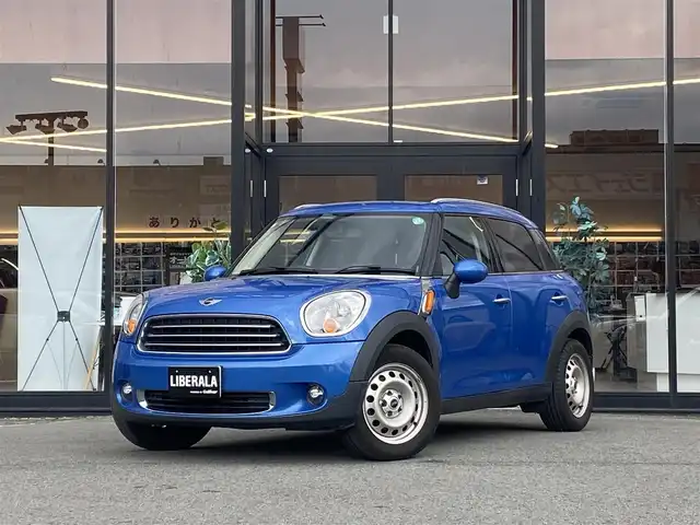 ＭＩＮＩ ミニ クロスオーバー ワン 福岡県 2013(平25)年 9.5万km トゥルーブルーM 1オーナー/純正オーディオ/CD.AUX/ルーフレール/電動格納ミラー/保証書/取説/スペアキー