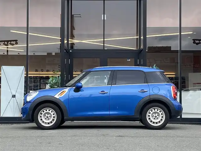 ＭＩＮＩ ミニ クロスオーバー ワン 福岡県 2013(平25)年 9.5万km トゥルーブルーM 1オーナー/純正オーディオ/CD.AUX/ルーフレール/電動格納ミラー/保証書/取説/スペアキー