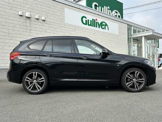 ＢＭＷ Ｘ１ xDrive 18d Mスポーツ 山形県 2019(平31)年 2.9万km サファイアブラックP コンフォートＰＫＧ/純正ナビ・ＢＴ・ＵＳＢ/バックカメラ/純正１９インチＡＷ/コンフォートアクセス/インテリジェントセーフティ/レーンキープ/シートヒーター/パワーシート/パワーバックドア/マニュアルモード付ＡＴ/パドルシフト/プッシュスタート/ミラー一体型ＥＴＣ/ダウンヒルアシスト/前後コーナーセンサー/アイドリングストップ/ＬＥＤヘッドライト/バックフォグ/リアガラススモークフィルム施工済/オートライト・デュアルオートエアコン
