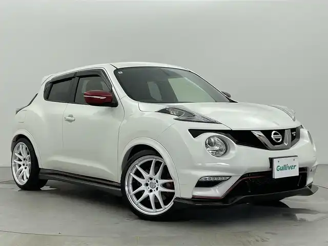 日産 ジューク ニスモ RS 富山県 2016(平28)年 3.1万km ブリリアントホワイトパール ワンオーナー/4WD/社外ナビ（AM/FM/CD/DVD/SD/BT）/フルセグTV/NISMOエアロ（フロント/サイド/リア/リアスポイラー）/社外WORK19インチAW/車高調/柿本マフラー/D席/N席ニスモ純正レカロシート/社外ステアリング（NARDI）/純正スプリング積込/純正マフラー積込/純正ステアリング積込/純正AW付きスタッドレスタイヤ積込（5部山）/NISMOフロアマット/ETC/レーダー探知機付きルームミラー/パドルシフト/純正HIDヘッドライト/オートライト/スマートキー×２/プッシュスタート/横滑り防止装置