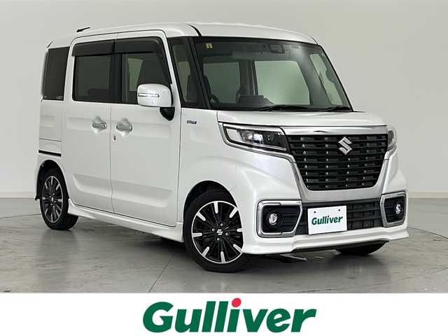 スズキ スペーシア カスタム HYBRID XS ターボ 宮城県 2018(平30)年 6.6万km ピュアホワイトP 禁煙車/デュアルセンサーブレーキサポート/スズキセーフティサポート/・後退時ブレーキサポート/・車線逸脱警報機能/・パーキングソナー/・横滑り防止装置/・ハイビームアシスト/両側パワースライドドア/クルーズコントロール/ストラーダフロティングナビ/CD.DVD.SD.BT.USB/フルセグTV/バックカメラ/ハーフレザーシート/シートヒーターD/パドルシフト/ビルトインETC/ドライブレコーダーF/ステアリングスイッチ/LEDヘッドライト/フォグランプ/アイドリングストップ/プッシュスタート/スマートキー/純正15インチAW/純正フロアマッド