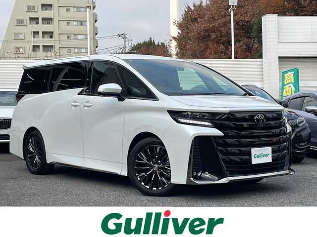 トヨタ ヴェルファイア Z プレミア 東京都 2024(令6)年 0.9万km プラチナホワイトパールマイカ ワンオーナー/新車時保証書　整備記録簿/ユーザーガイド/セーフティーセンス/トヨタチームメイト/14インチディスプレイオーディオ/純正ナビ/フルセグTV【走行中映ります】/USB/BT/Miracast/AppleCarplay/パノラミックビューモニター　ETC【2.0】/デジタルインナーミラー/ヘッドアップディスプレイ/ドライブレコーダー【前後】/AC100V100W/左右独立ムーンルーフ　レザーシート/前席後席シートヒーター/ベンチレーター/パワーシート【運転席メモリー付】/両側パワースライドドア/パワーバックドア/3眼LEDヘッドライト/スマートキー×２/サイド/カーテン/ニーエアバック/純正19インチアルミ