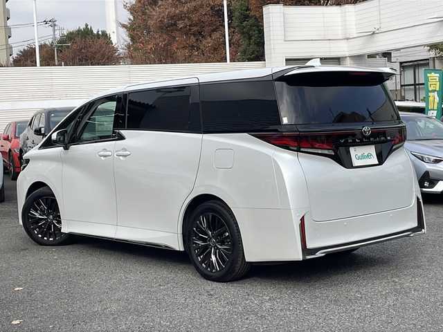 トヨタ ヴェルファイア Z プレミア 東京都 2024(令6)年 0.9万km プラチナホワイトパールマイカ ワンオーナー/新車時保証書　整備記録簿/ユーザーガイド/セーフティーセンス/トヨタチームメイト/14インチディスプレイオーディオ/純正ナビ/フルセグTV【走行中映ります】/USB/BT/Miracast/AppleCarplay/パノラミックビューモニター　ETC【2.0】/デジタルインナーミラー/ヘッドアップディスプレイ/ドライブレコーダー【前後】/AC100V100W/左右独立ムーンルーフ　レザーシート/前席後席シートヒーター/ベンチレーター/パワーシート【運転席メモリー付】/両側パワースライドドア/パワーバックドア/3眼LEDヘッドライト/スマートキー×２/サイド/カーテン/ニーエアバック/純正19インチアルミ
