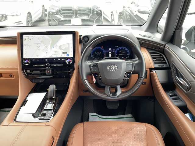 トヨタ ヴェルファイア Z プレミア 東京都 2024(令6)年 0.9万km プラチナホワイトパールマイカ ワンオーナー/新車時保証書　整備記録簿/ユーザーガイド/セーフティーセンス/トヨタチームメイト/14インチディスプレイオーディオ/純正ナビ/フルセグTV【走行中映ります】/USB/BT/Miracast/AppleCarplay/パノラミックビューモニター　ETC【2.0】/デジタルインナーミラー/ヘッドアップディスプレイ/ドライブレコーダー【前後】/AC100V100W/左右独立ムーンルーフ　レザーシート/前席後席シートヒーター/ベンチレーター/パワーシート【運転席メモリー付】/両側パワースライドドア/パワーバックドア/3眼LEDヘッドライト/スマートキー×２/サイド/カーテン/ニーエアバック/純正19インチアルミ