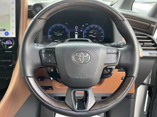 トヨタ ヴェルファイア Z プレミア 東京都 2024(令6)年 0.9万km プラチナホワイトパールマイカ ワンオーナー/新車時保証書　整備記録簿/ユーザーガイド/セーフティーセンス/トヨタチームメイト/14インチディスプレイオーディオ/純正ナビ/フルセグTV【走行中映ります】/USB/BT/Miracast/AppleCarplay/パノラミックビューモニター　ETC【2.0】/デジタルインナーミラー/ヘッドアップディスプレイ/ドライブレコーダー【前後】/AC100V100W/左右独立ムーンルーフ　レザーシート/前席後席シートヒーター/ベンチレーター/パワーシート【運転席メモリー付】/両側パワースライドドア/パワーバックドア/3眼LEDヘッドライト/スマートキー×２/サイド/カーテン/ニーエアバック/純正19インチアルミ