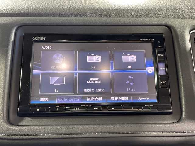 ホンダ ヴェゼル ハイブリッド Z ホンダセンシング 神奈川県 2018(平30)年 5.5万km プレミアムクリスタルレッドM 純正７型SDナビゲーション【VXM-185YFi】/フルセグ　CD DVD　iPod　AM FM MUSICRACK　Bluetooth　AUX　USB　VTR/バックカメラ/シルバールーフレール/ホンダセンシング/CMBS衝突軽減ブレーキ/LKAS車線維持支援システム/先行車発進告知/標識認識機能/路外逸脱抑制機能/レーダークルーズコントロール/RFPリアアクティブフォースペダル/ハーフレザーシート/前席シートヒーター/革巻きステアリング/パドルシフト/ビルトインETC/プッシュスタート/スマートキー/純正17インチアルミホイール/純正サイド/リアスポイラー/LEDヘッドライト/オートライト/フロントフォグランプ/スペアキー