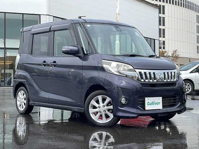 三菱 ｅＫスペース カスタムG e－アシスト 青森県 2015(平27)年 4.8万km パープリッシュネイビーパール ・4WD/・社外ナビ/・バックカメラ/・横滑り防止/・衝突被害軽減ブレーキ/・プッシュスタート/・スマートキー/・両側パワースライドドア/・後席サンシェード/・後席サーキュレーター/・純正14AW/・純正フロアマット