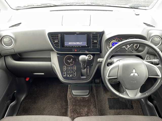 三菱 ｅＫスペース カスタムG e－アシスト 青森県 2015(平27)年 4.8万km パープリッシュネイビーパール ・4WD/・社外ナビ/・バックカメラ/・横滑り防止/・衝突被害軽減ブレーキ/・プッシュスタート/・スマートキー/・両側パワースライドドア/・後席サンシェード/・後席サーキュレーター/・純正14AW/・純正フロアマット