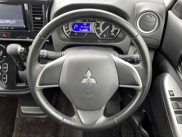 三菱 ｅＫスペース カスタムG e－アシスト 青森県 2015(平27)年 4.8万km パープリッシュネイビーパール ・4WD/・社外ナビ/・バックカメラ/・横滑り防止/・衝突被害軽減ブレーキ/・プッシュスタート/・スマートキー/・両側パワースライドドア/・後席サンシェード/・後席サーキュレーター/・純正14AW/・純正フロアマット