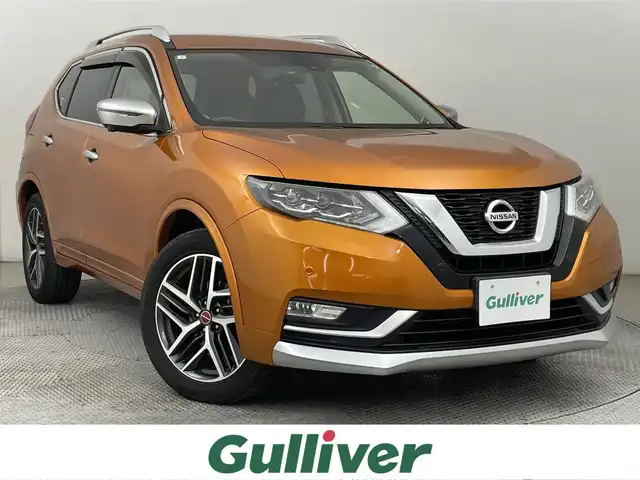 日産 エクストレイル モード・プレミア 道央・札幌 2017(平29)年 6.1万km プレミアムコロナオレンジ ・４WD/・純正SDナビゲーション/　CD/DVD/フルセグ/BT/USB/AUX/・純正ドライブレコーダー前方録画/・ビルトインETC/・アラウンドビューモニター/・エマージェンシーブレーキ/・プロパイロット/・オートブレーキホールド/・インテリジェントルームミラー/・レーダークルーズコントロール/・レザーシート/・全席シートヒーター/・横滑り防止装置/・前後コーナーセンサー/・レーンキープアシスト/・オートライト/・ダウンヒルアシストコントロール/・LEDヘッドライト/・フロントフォグランプ/・純正フロアマット/・スマートキー/・プッシュスタート/・スペアキー１本/・ルーフレール/・オーテックAW１９インチ/・TVキット/・アルパインツィーター/・保証書付き/・取説付き