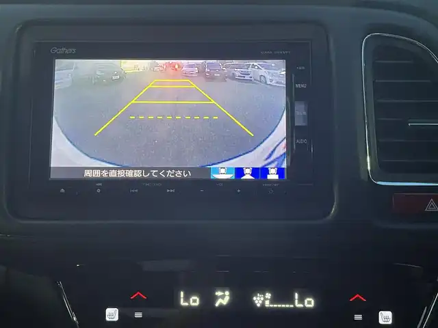 ホンダ ヴェゼル ハイブリッド Z 東京都 2016(平28)年 13.4万km ホワイトオーキッドパール パドルシフト/ナビロック