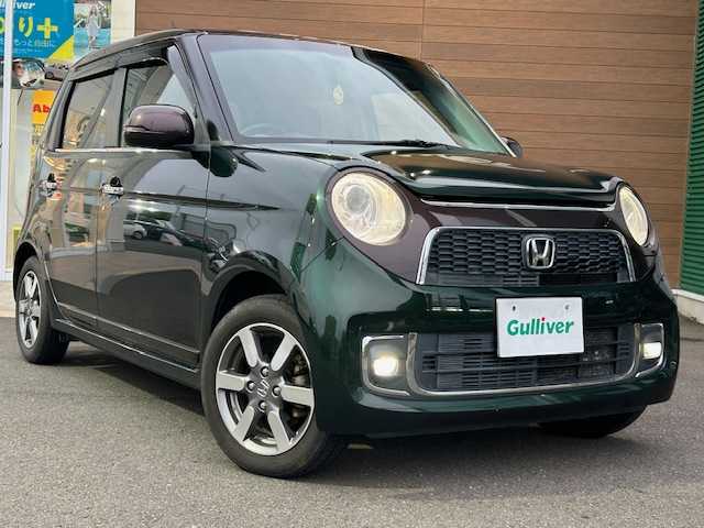 ホンダ Ｎ ＯＮＥ プレミアムSSブラウンスタイルパッケージ 静岡県 2016(平28)年 5万km ブリティッシュグリーンP 純正ディスプレイオーディオ　ＡＭ　ＦＭ　ＣＤ　Ｂｌｕｅｔｏｏｔｈ　ＵＳＢ　ＴＶ　バックカメラ　プッシュスタート　スマートキー　ＥＴＣ　前席シートヒータ　クルーズコントロール　ＨＩＤライト　ＬＥＤフォグ/	ナビ装着用スペシャルパッケージ＋ETC車載器(ナビ連動)/	IRカット(遮熱)/UVカット機能付フロントウインドウガラス/	IRカット(遮熱)/スーパーUVカットフロントドアガラス/	オートリトラミラー＆ディスチャージヘッドライト＜HID＞(オートレベリング/オートライト)/	親水/ヒーテッドドアミラー＋フロントドア撥水ガラス＋運転席＆助手席シートヒーター/	コンビシート＋LEDフォグライト
