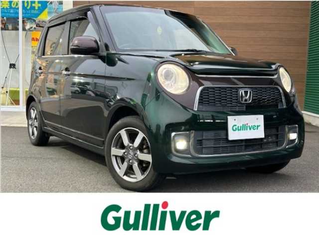 ホンダ Ｎ ＯＮＥ プレミアムSSブラウンスタイルパッケージ 静岡県 2016(平28)年 5万km ブリティッシュグリーンP 純正ディスプレイオーディオ　ＡＭ　ＦＭ　ＣＤ　Ｂｌｕｅｔｏｏｔｈ　ＵＳＢ　ＴＶ　バックカメラ　プッシュスタート　スマートキー　ＥＴＣ　前席シートヒータ　クルーズコントロール　ＨＩＤライト　ＬＥＤフォグ/	ナビ装着用スペシャルパッケージ＋ETC車載器(ナビ連動)/	IRカット(遮熱)/UVカット機能付フロントウインドウガラス/	IRカット(遮熱)/スーパーUVカットフロントドアガラス/	オートリトラミラー＆ディスチャージヘッドライト＜HID＞(オートレベリング/オートライト)/	親水/ヒーテッドドアミラー＋フロントドア撥水ガラス＋運転席＆助手席シートヒーター/	コンビシート＋LEDフォグライト