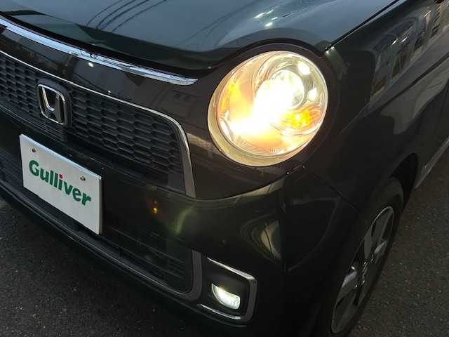 ホンダ Ｎ ＯＮＥ プレミアムSSブラウンスタイルパッケージ 静岡県 2016(平28)年 5万km ブリティッシュグリーンP 純正ディスプレイオーディオ　ＡＭ　ＦＭ　ＣＤ　Ｂｌｕｅｔｏｏｔｈ　ＵＳＢ　ＴＶ　バックカメラ　プッシュスタート　スマートキー　ＥＴＣ　前席シートヒータ　クルーズコントロール　ＨＩＤライト　ＬＥＤフォグ/	ナビ装着用スペシャルパッケージ＋ETC車載器(ナビ連動)/	IRカット(遮熱)/UVカット機能付フロントウインドウガラス/	IRカット(遮熱)/スーパーUVカットフロントドアガラス/	オートリトラミラー＆ディスチャージヘッドライト＜HID＞(オートレベリング/オートライト)/	親水/ヒーテッドドアミラー＋フロントドア撥水ガラス＋運転席＆助手席シートヒーター/	コンビシート＋LEDフォグライト