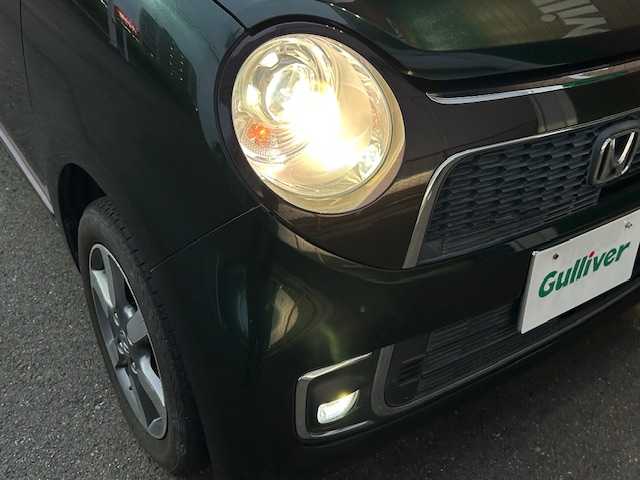 ホンダ Ｎ ＯＮＥ プレミアムSSブラウンスタイルパッケージ 静岡県 2016(平28)年 5万km ブリティッシュグリーンP 純正ディスプレイオーディオ　ＡＭ　ＦＭ　ＣＤ　Ｂｌｕｅｔｏｏｔｈ　ＵＳＢ　ＴＶ　バックカメラ　プッシュスタート　スマートキー　ＥＴＣ　前席シートヒータ　クルーズコントロール　ＨＩＤライト　ＬＥＤフォグ/	ナビ装着用スペシャルパッケージ＋ETC車載器(ナビ連動)/	IRカット(遮熱)/UVカット機能付フロントウインドウガラス/	IRカット(遮熱)/スーパーUVカットフロントドアガラス/	オートリトラミラー＆ディスチャージヘッドライト＜HID＞(オートレベリング/オートライト)/	親水/ヒーテッドドアミラー＋フロントドア撥水ガラス＋運転席＆助手席シートヒーター/	コンビシート＋LEDフォグライト