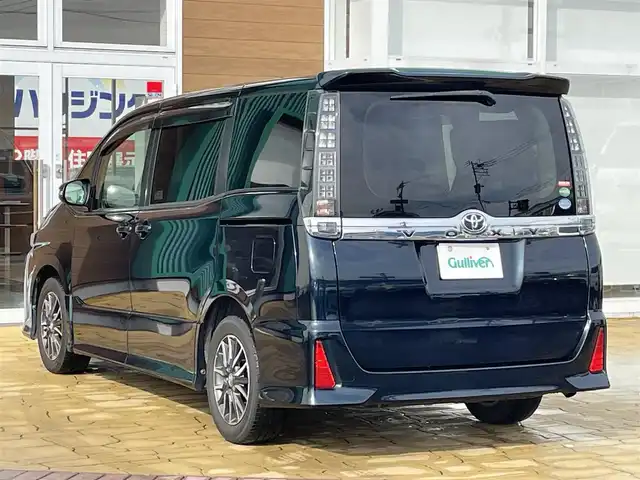 トヨタ ヴォクシー ZS 宮崎県 2014(平26)年 10.9万km ブラッキッシュアゲハガラスフレーク 純正9インチナビ/CD/DVD/BT/フルセグTV/フリップダウンモニター/バックカメラ/前後ドライブレコーダー/両側パワースライドドア/LEDオートライト/純正16インチAW/ステアリングスイッチ/アイドリングストップ/プッシュスタート/ビルトインETC/禁煙車