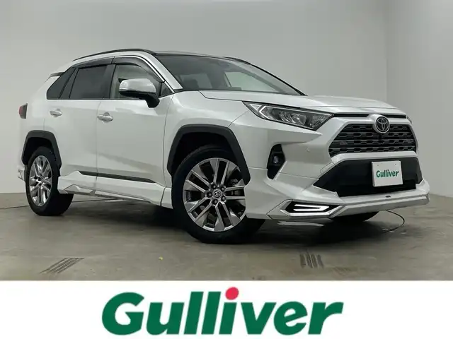 トヨタ ＲＡＶ４ G Zパッケージ 岡山県 2023(令5)年 0.8万km プラチナホワイトパールマイカ ワンオーナー/トヨタセーフティーセンス/純正１０．５インチナビ　/（CD/DVD/BT/メモリ/フルセグTV）/モデリスタフルエアロ　/サンルーフ/本革黒シート/プリクラッシュセーフティ/アラウンドビューモニター　/クルーズコントロール/ビルドインＥＴＣ２．０　/シートヒーター/エアシート/ステアリングヒーター/デジタルインナーミラー　/ＬＥＤヘッドライト/チルステ/ISOFIX/プリクラッシュセーフティー/ステアリングスイッチ/置くだけ充電/純正フロアマット/フォグランプ/純正ドライブレコーダー（前後）/オートライト/オートハイビーム/電動リアゲート/ブラインドスポットモニター/取扱説明書/新車保証書