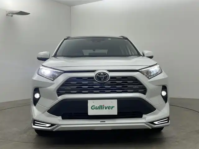 トヨタ ＲＡＶ４ G Zパッケージ 岡山県 2023(令5)年 0.8万km プラチナホワイトパールマイカ ワンオーナー/トヨタセーフティーセンス/純正１０．５インチナビ　/（CD/DVD/BT/メモリ/フルセグTV）/モデリスタフルエアロ　/サンルーフ/本革黒シート/プリクラッシュセーフティ/アラウンドビューモニター　/クルーズコントロール/ビルドインＥＴＣ２．０　/シートヒーター/エアシート/ステアリングヒーター/デジタルインナーミラー　/ＬＥＤヘッドライト/チルステ/ISOFIX/プリクラッシュセーフティー/ステアリングスイッチ/置くだけ充電/純正フロアマット/フォグランプ/純正ドライブレコーダー（前後）/オートライト/オートハイビーム/電動リアゲート/ブラインドスポットモニター/取扱説明書/新車保証書