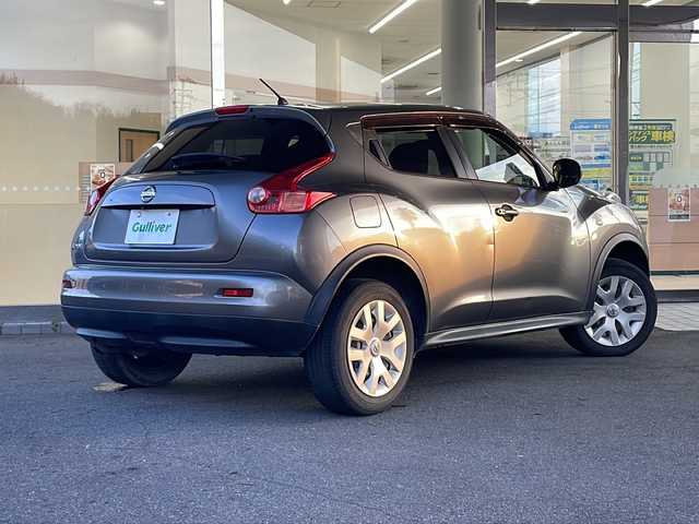 日産 ジューク 15RX タイプV 福島県 2012(平24)年 10.6万km ダークメタルグレー 登録時走行距離：106033km/純正ナビ/ (BT/CD/DVD/フルセグTV/SD/AUX/AM/FM)/バックカメラ/プッシュスタート/ETC/フロアマット/電動格納ミラー/デュアルエアバック/ヘッドライトレベライザー/アームレスト/パワーアウトレット/オートライト/スマートキー/保証書/取扱説明書