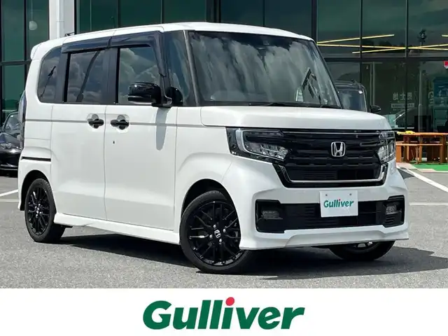 ホンダ Ｎ ＢＯＸ カスタム L ターボ スタイル+ブラック 奈良県 2022(令4)年 1.8万km プラチナホワイトパール ９型ナビ　/(ＨＤＭＩ/FM/AM)　　/バックカメラ　/フルセグＴＶ　/両側パワースライドドア　/レーダークルーズコントロール　/パドルシフト　/革巻きステアリング　/ＬＥＤヘッドライト/ハーフレザーシート/前席シートヒーター