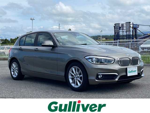 ＢＭＷ １１８ｉ スタイル 富山県 2016(平28)年 2.7万km 茶 禁煙車　/純正HDDナビ /地デジ　/バックカメラ　/コーナーセンサー　/LEDヘッドライト　/クルーズコントロール　　/スマートキー　/純正アルミホイール　/純正オーディオ　/ウィンカーミラー　/電動格納ミラー　/ETC　/プッシュスタート